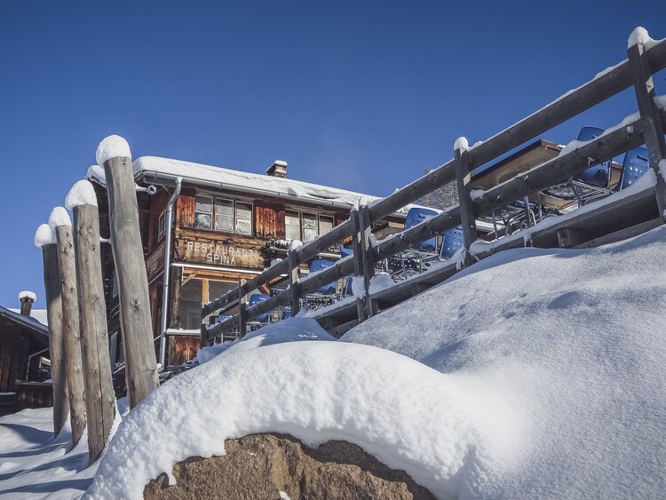 Das idyllisch verschneite Restaurant Spina in Davos. | © Davos Klosters Mountainis